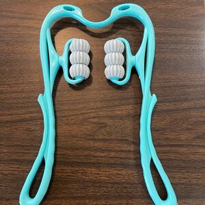 Neck massage roll. Brand new. Ready to help with neck and shoulder pain